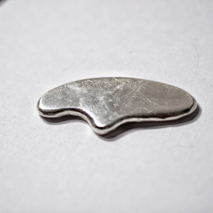 Solid Silver Gua Sha Face Tool for wholesale by Elizabeth Cournoyer Jewelry