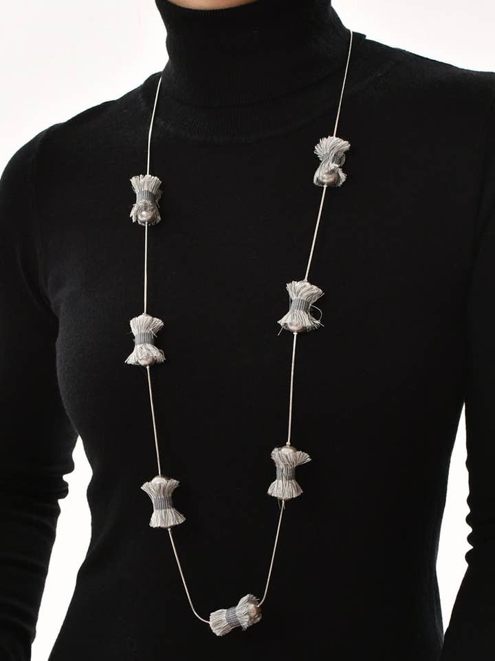 Long necklace with decorated pearls for wholesale by Victoria Moda