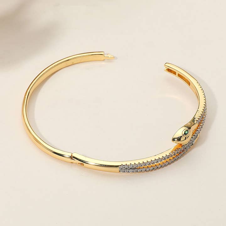 Sensibling Corp. - Vendita all'ingrosso Bracciale a polsino - SECRET BOX_Braceletto rigido a cerniera in acciaio inossidabile con pavé di strass e serpente elegante1