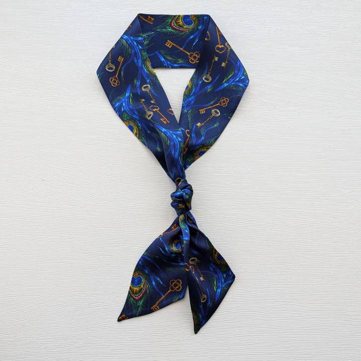 Silk Satin Skinny Scarf: Blue Peacocks & Keys for wholesale by Poems And Polka Dots