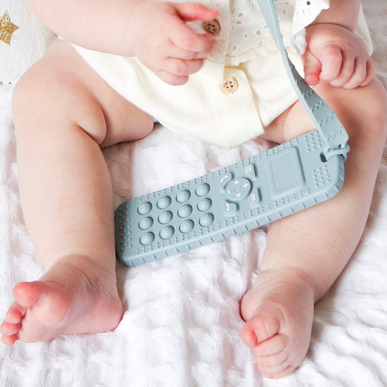 Arctic Blue Sensory Popper Teether Phone for wholesale on Faire12