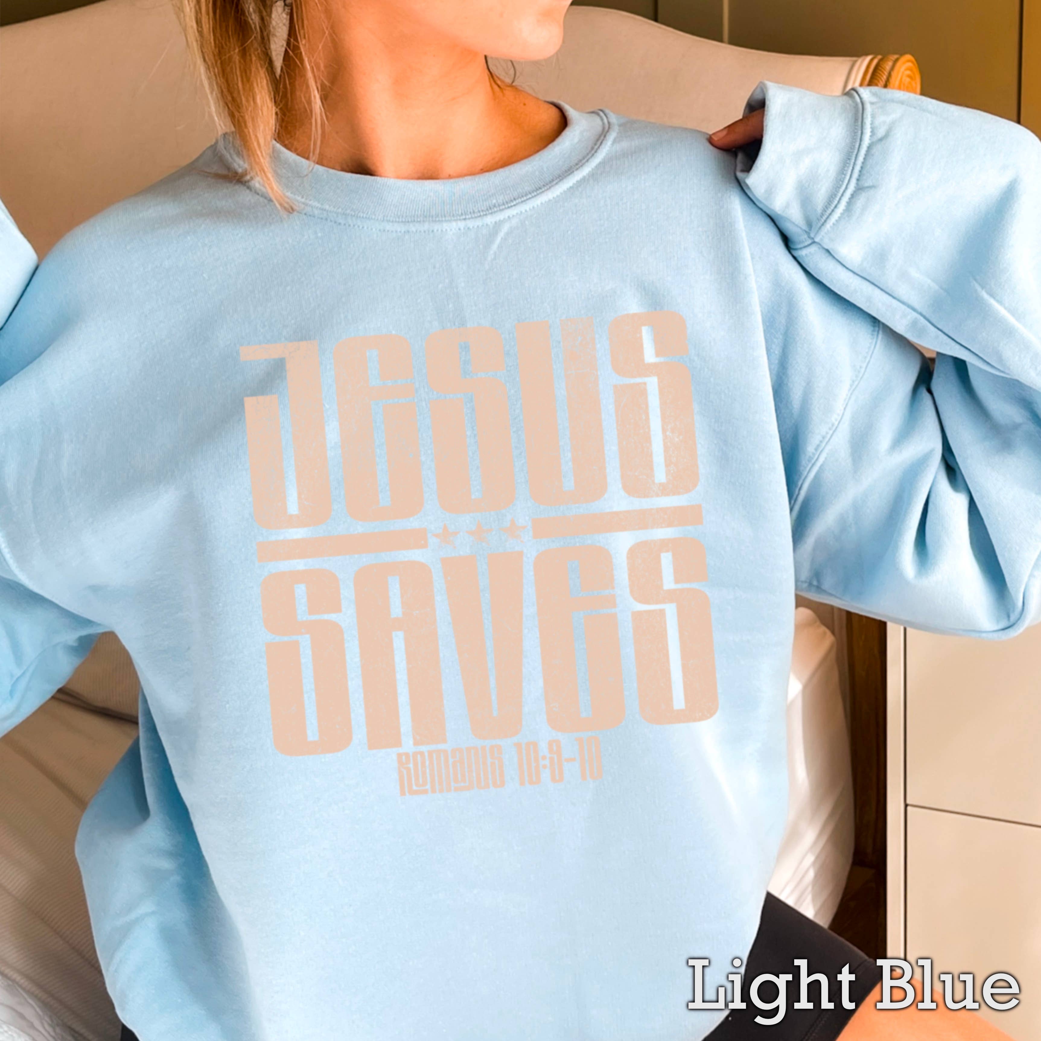 Shoppe SHC – Camisola gráfica - Mulher por atacado – Camisola de Mulher Cristã "Jesus Salva"15