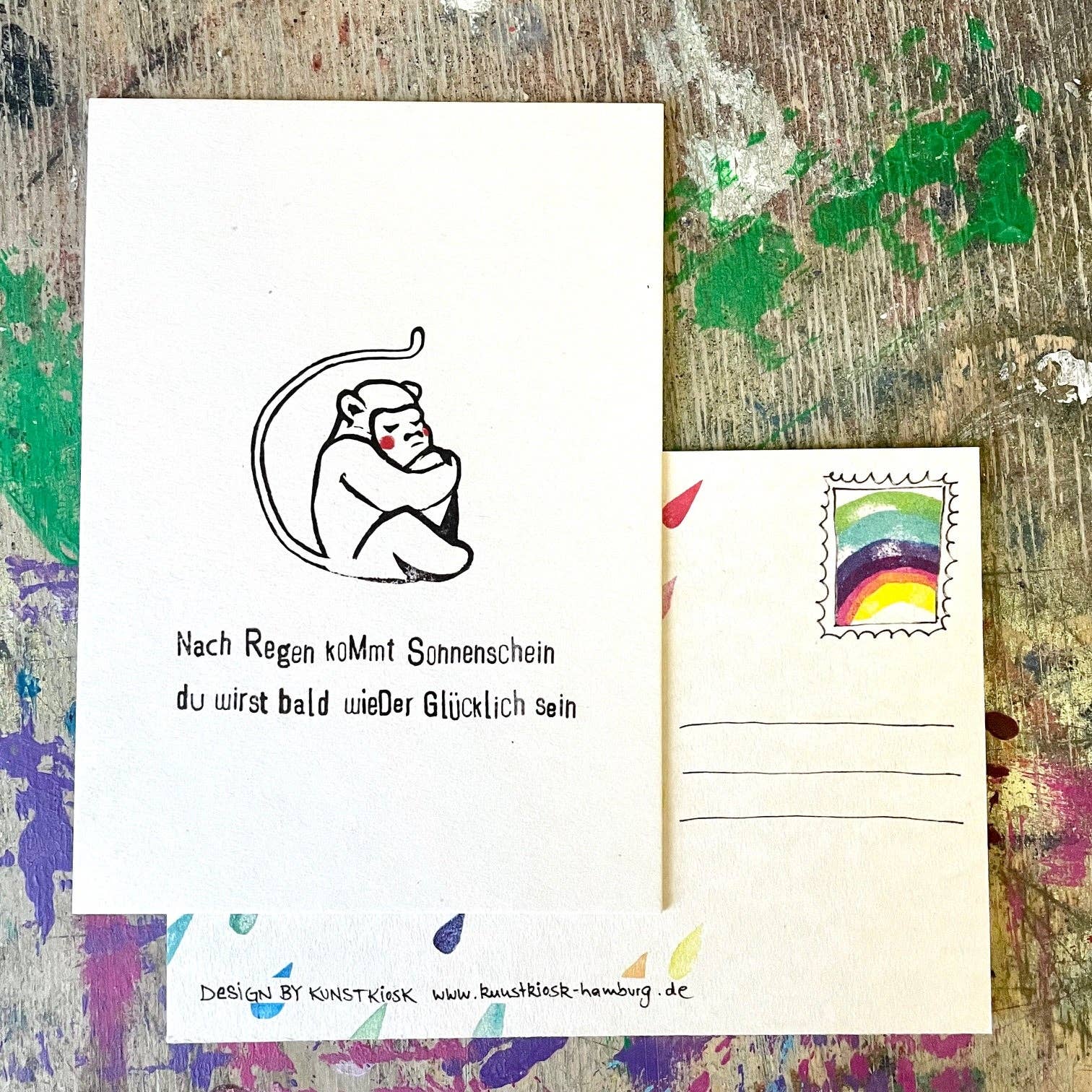 kuki – wholesale Vykort – "efter regn kommer solsken... " kuki vykort 10-pack1