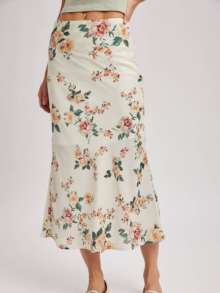 GONNA MIDI IN RASO CON STAMPA FLOREALE per la vendita all'ingrosso da parte di Bluivy