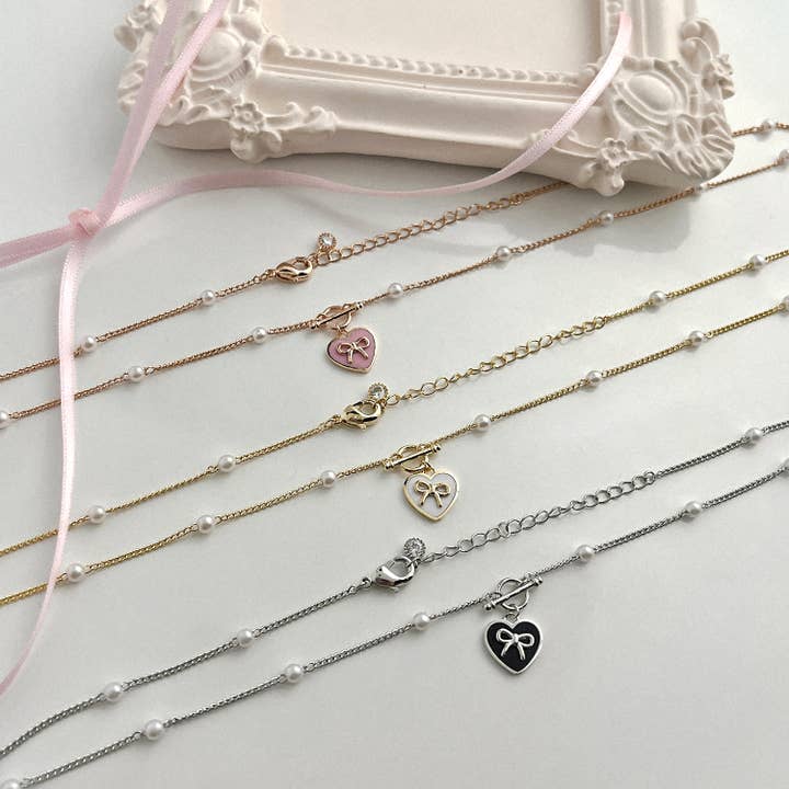 MOND HAUS - Wholesale Pendant/Charm Necklace - KOKOA Heart Charm Necklace with Ribbon and Pearl Accents