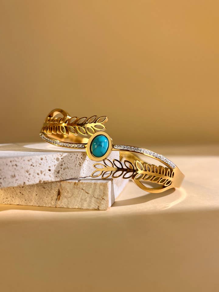 Stainless steel bangle bracelet with turquoise stone leaf for wholesale by COSMOS