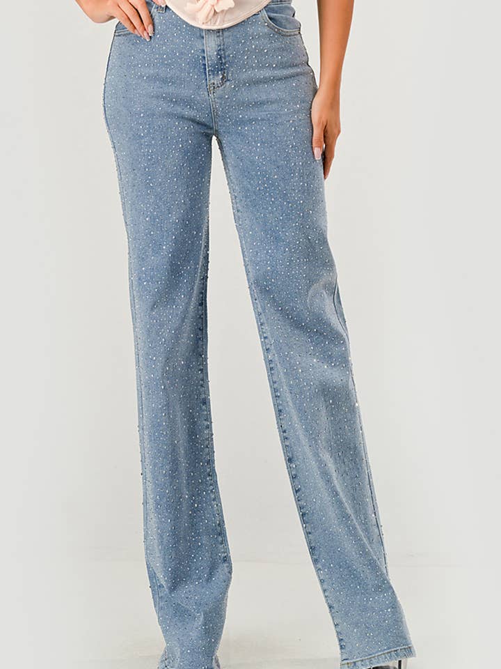 Jeans a zampa con motivo a pois e strass NP4090A per la vendita all'ingrosso da parte di NEWGENS