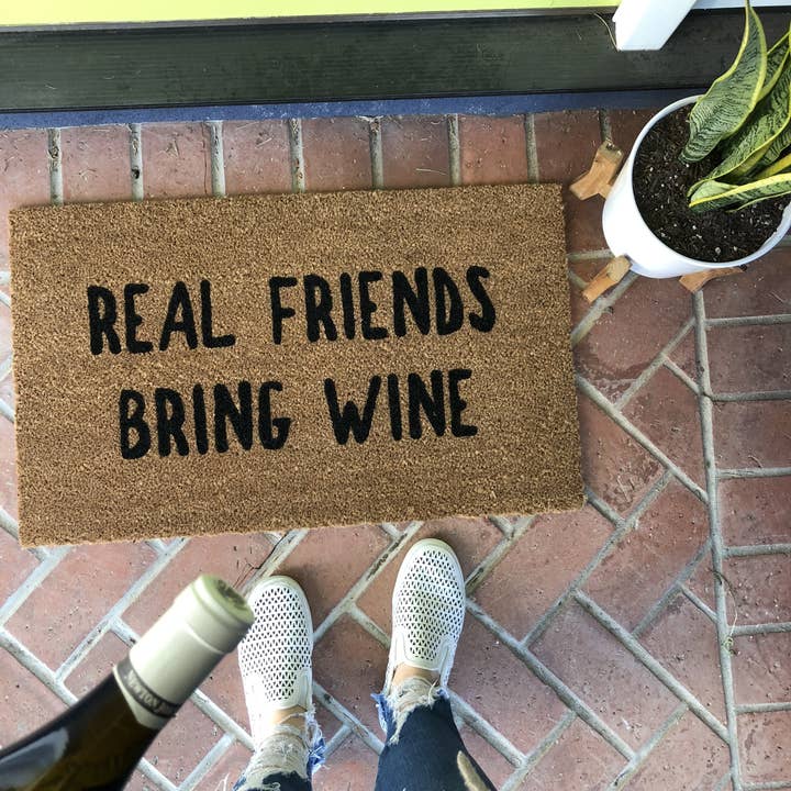Funny Wine Doormat - Real Friends Bring Wine for wholesale by Nickel Designs Doormats