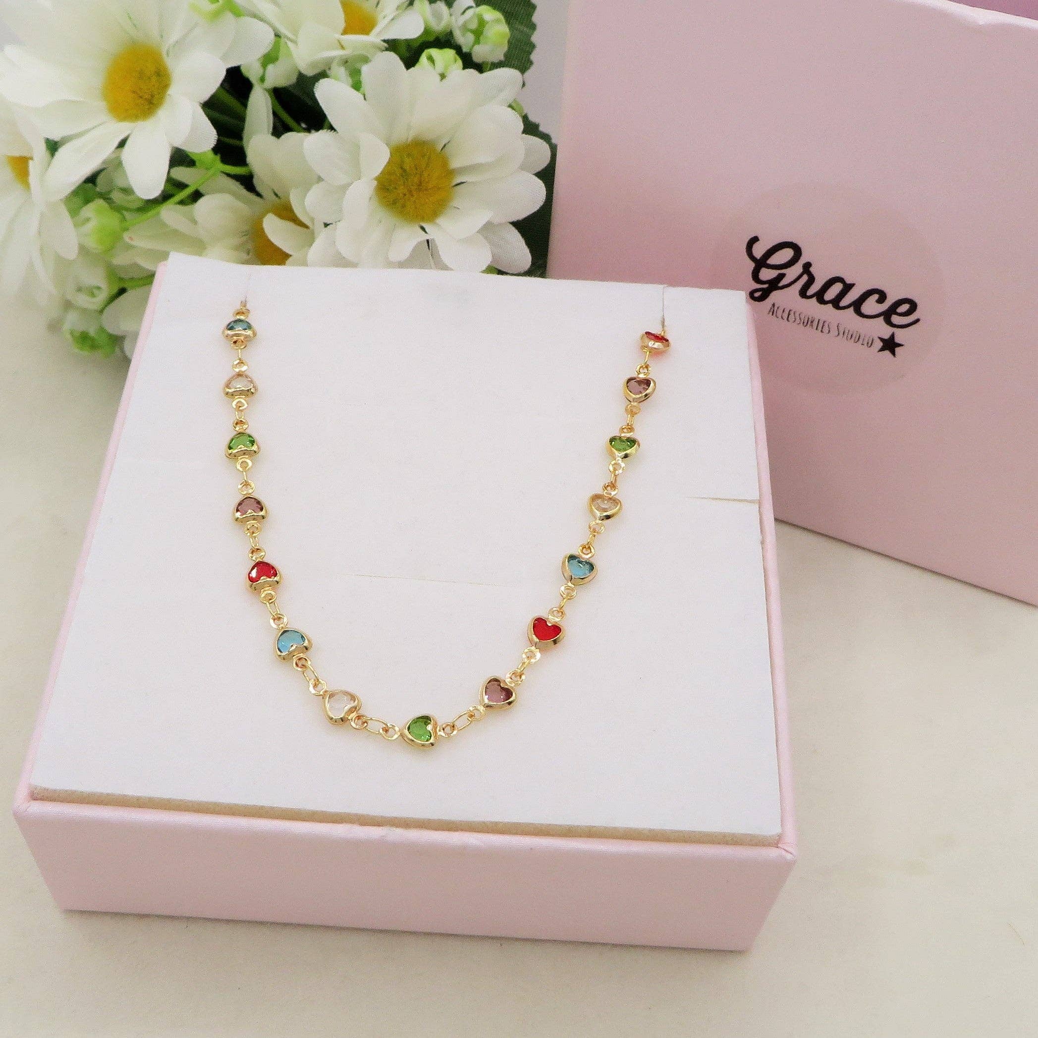 GRENADA ~ Collana ACCIAIO INOSSIDABILE con cuori zirconati rainbow for wholesale on Faire2