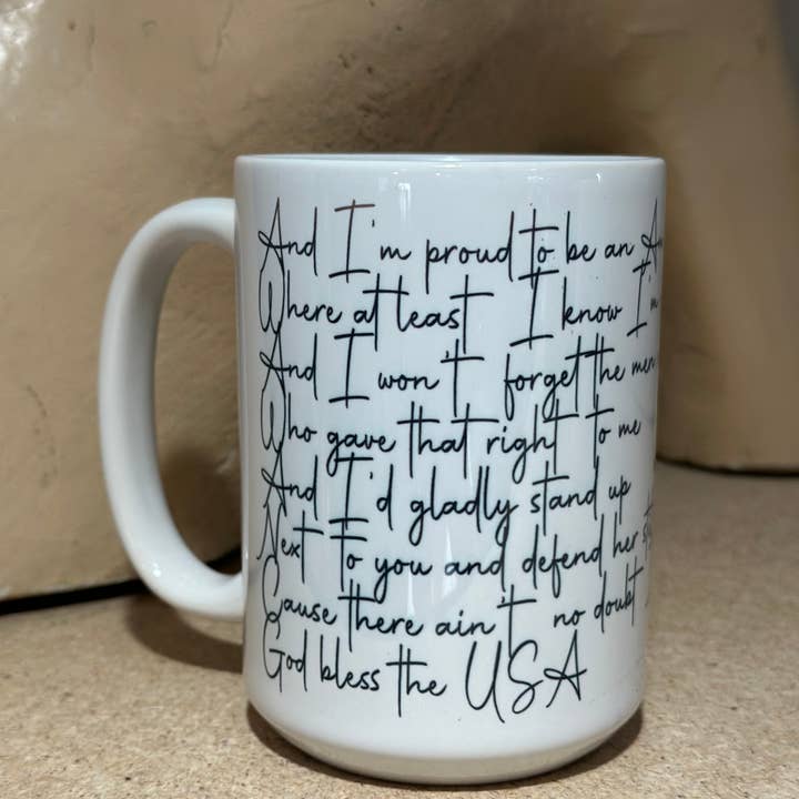 Tasse à café en céramique God Bless the USA Lyric 15 oz pour la vente par Crooked Halo