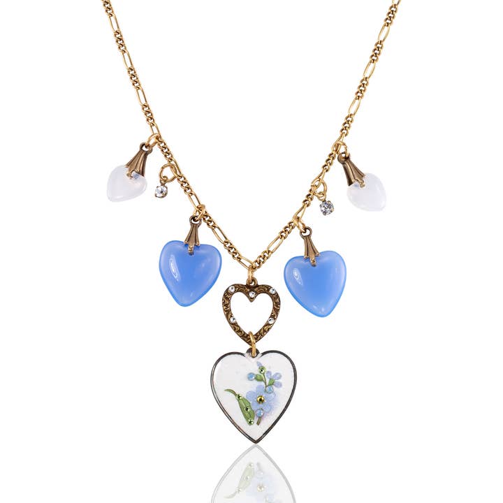 Friendship White and Blue Crystal Heart & Charm Necklace for wholesale by Anne Koplik Designs, Inc.