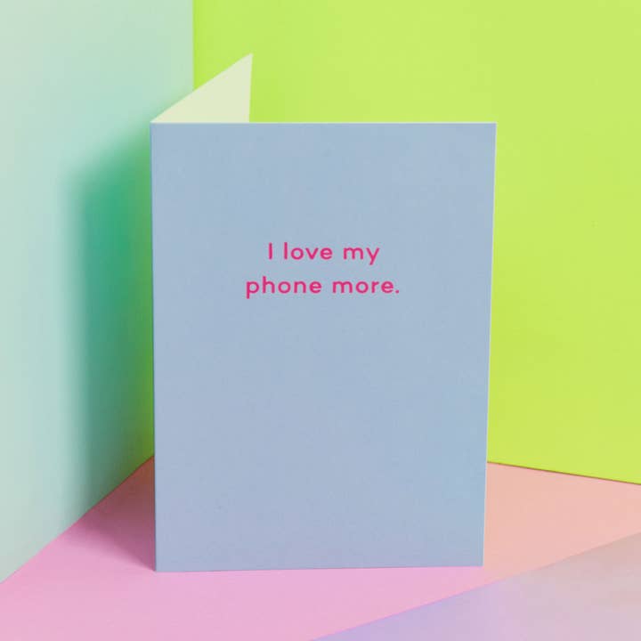 I Love My Phone More. anniversary card for wholesale by Mean Mail