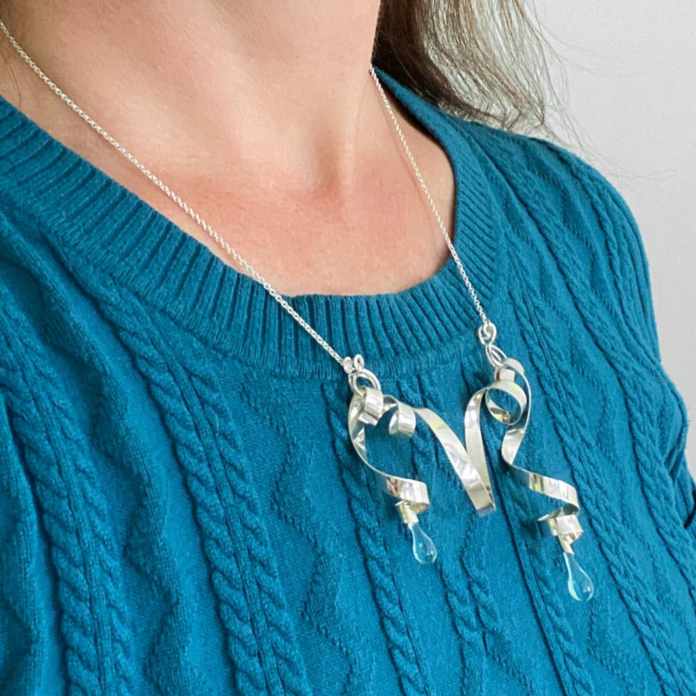 Sundrop Jewelry - Wholesale Pendant/Charm Necklace - Asymmetric Necklace with Loops of Silver Ribbon4