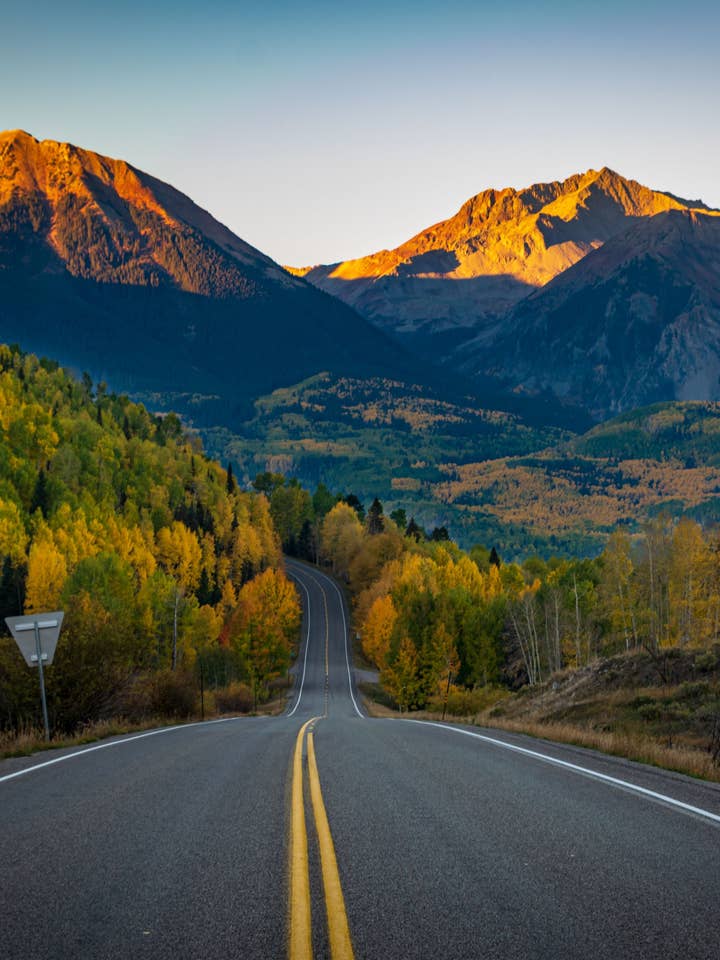 Denver Poster - Sunrise over the San Juans for wholesale by Posters & Puzzles