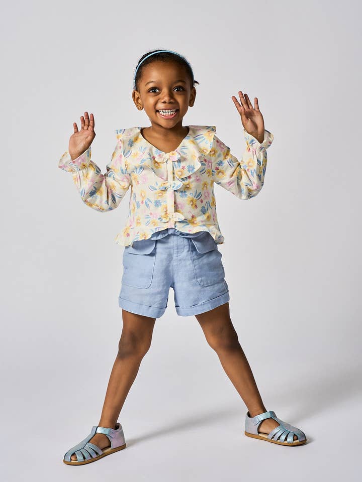 Spring Floral Serendipity Top for wholesale on Faire