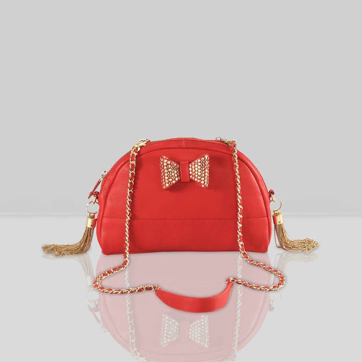 'MARYLAND' Red Designer Leather Half Moon Crossbody Bag and other Purchase Wholesale gold tassels. Free Returns & Net 60 Terms on Faire trending on Faire.