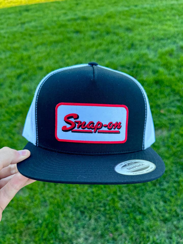 Snap-On Black/White Snapback for wholesale by River Bent Hat Co.
