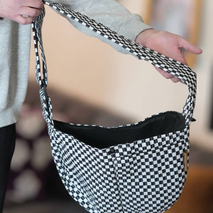 Black and White Pet Sling Carrier for wholesale on Faire3