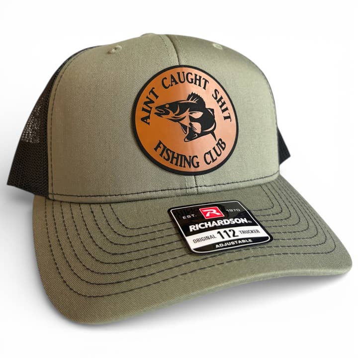 Ain't Caught Shit Fishing Club - Richardson 112 Trucker Hat - Multiple Colors for wholesale by Brave Mind Hat Co