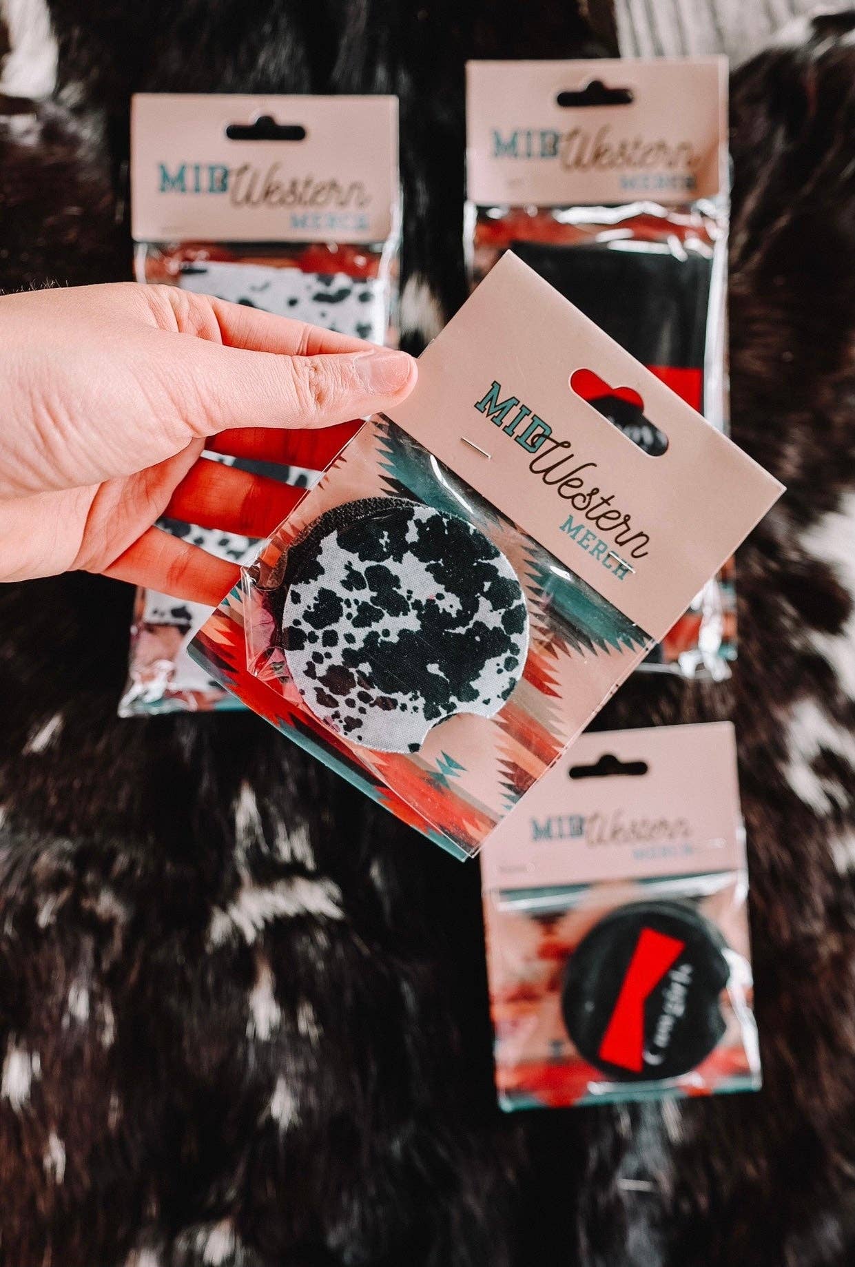 The Front Porch Label - Wholesale Car Coaster - Women's - Cowgirl Babe Black Cow Print Car Coasters 2-Pack1