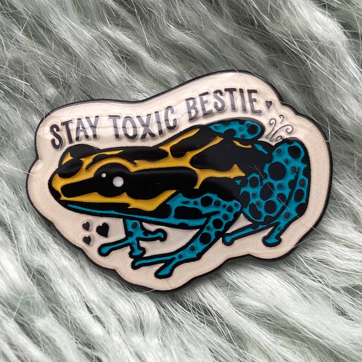 Stay Toxic Poison Dart Frog Enamel Pin for wholesale by Wild Hunt