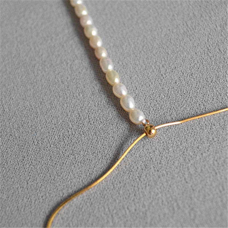 Revelari - Wholesale Pendant/Charm Necklace - Elegant Pearl and Gold Necklace with Pendant1