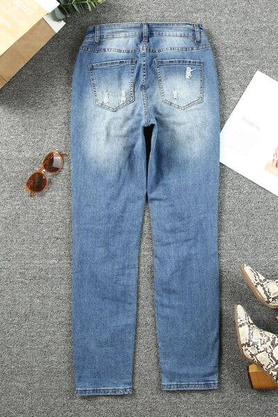 Medium Leopard Distressed Pocketed Straight Jeans for wholesale on Faire2