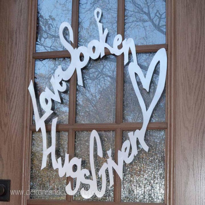 Love Spoken Hugs Given Wreath for wholesale by Deirdre & Company