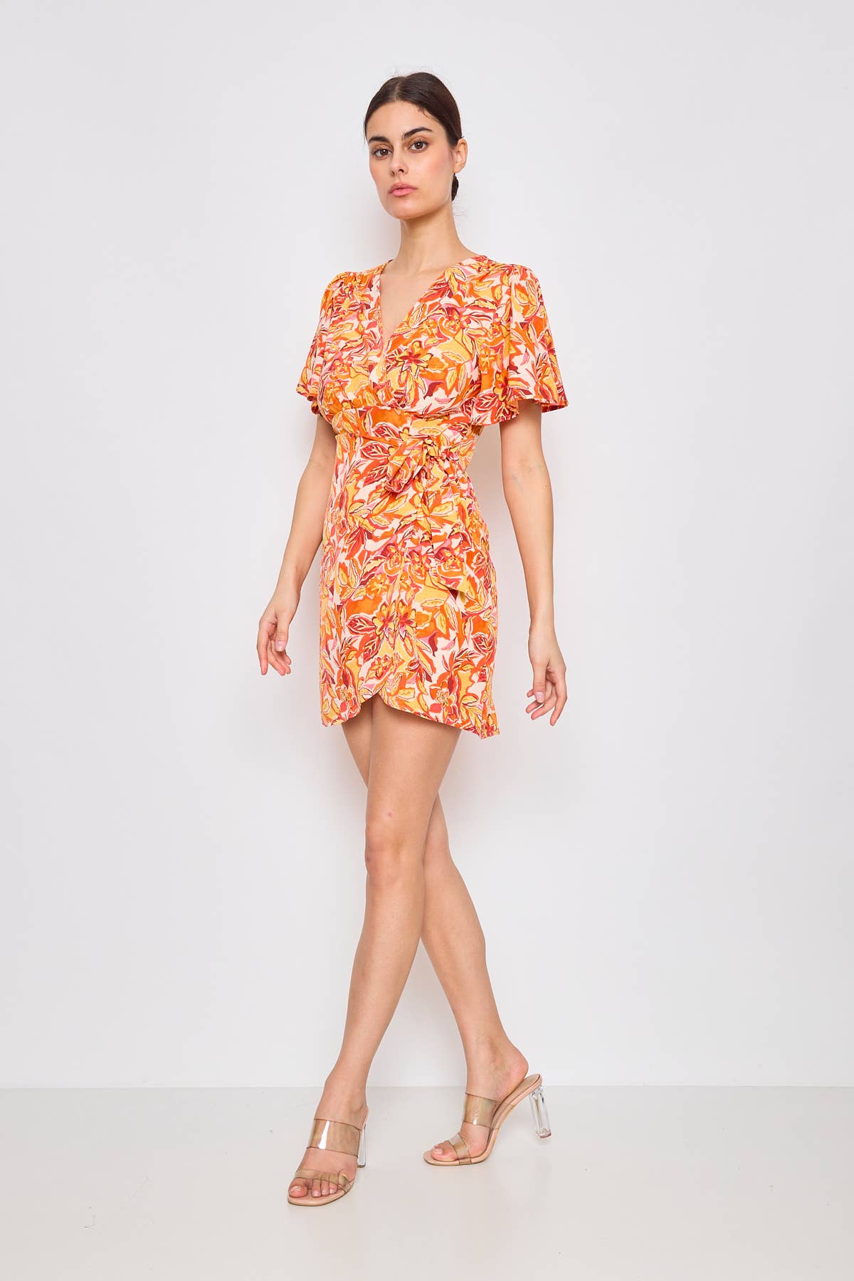 Orange Short wrap summer dress with floral print for wholesale on Faire2