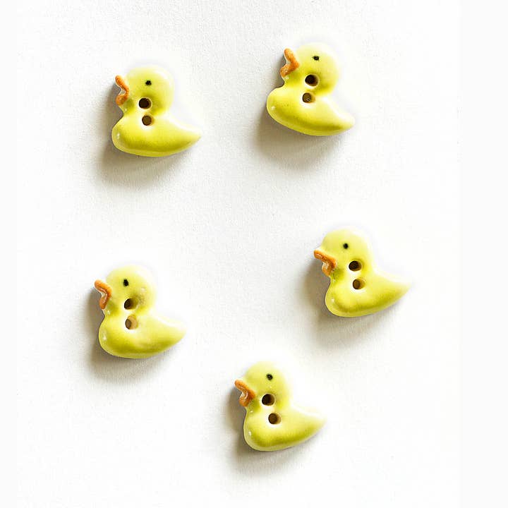 L164 Yellow Duckling Buttons for wholesale by Incomparable Buttons