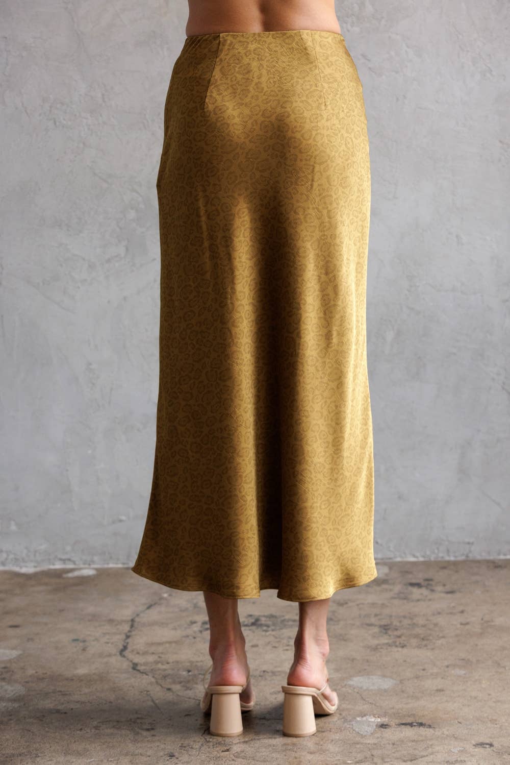 DARK MUSTARD JS5578-9-LEOPARD SATIN JACQUARD MIDI SKIRT for wholesale on Faire1