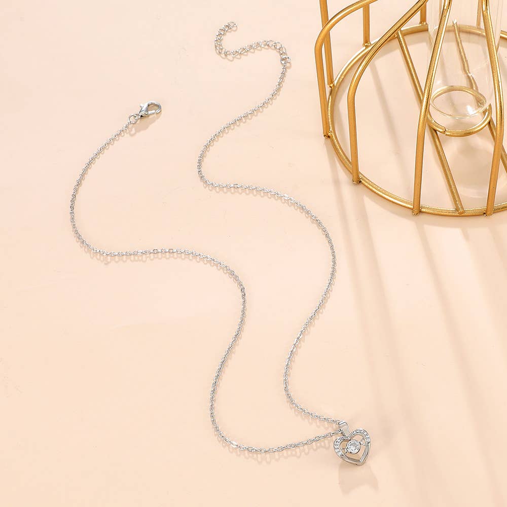 Gemscape UK - Vente Colliers à pendentif - Collier en forme de cœur en or et argent : des bijoux pour tous11