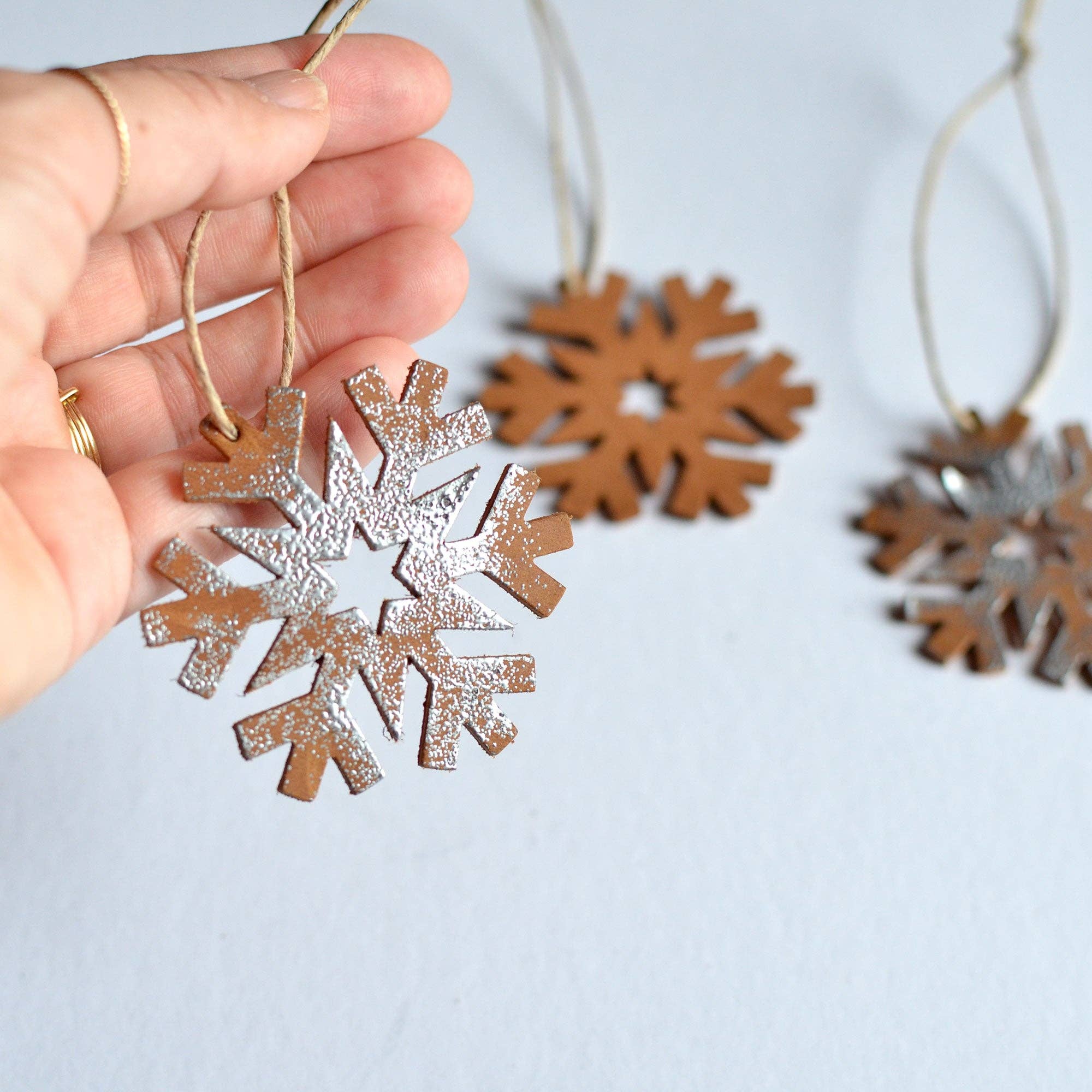 Moss Bags - Wholesale Ornament Set - Leather Snowflake Ornament Box Set: 4 Leather Snowflake Ornaments + 1 Christmas Card1