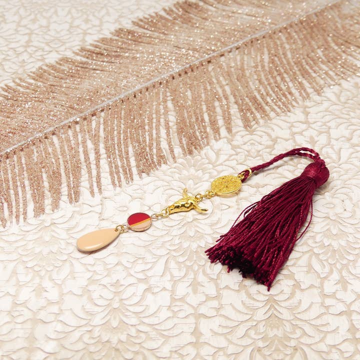 Resin book bookmark with red and gold tassel for wholesale by Lydée Déco