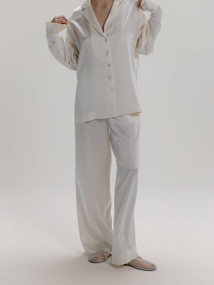 Breda sidenbyxor i mjölkvit för wholesale av Alas