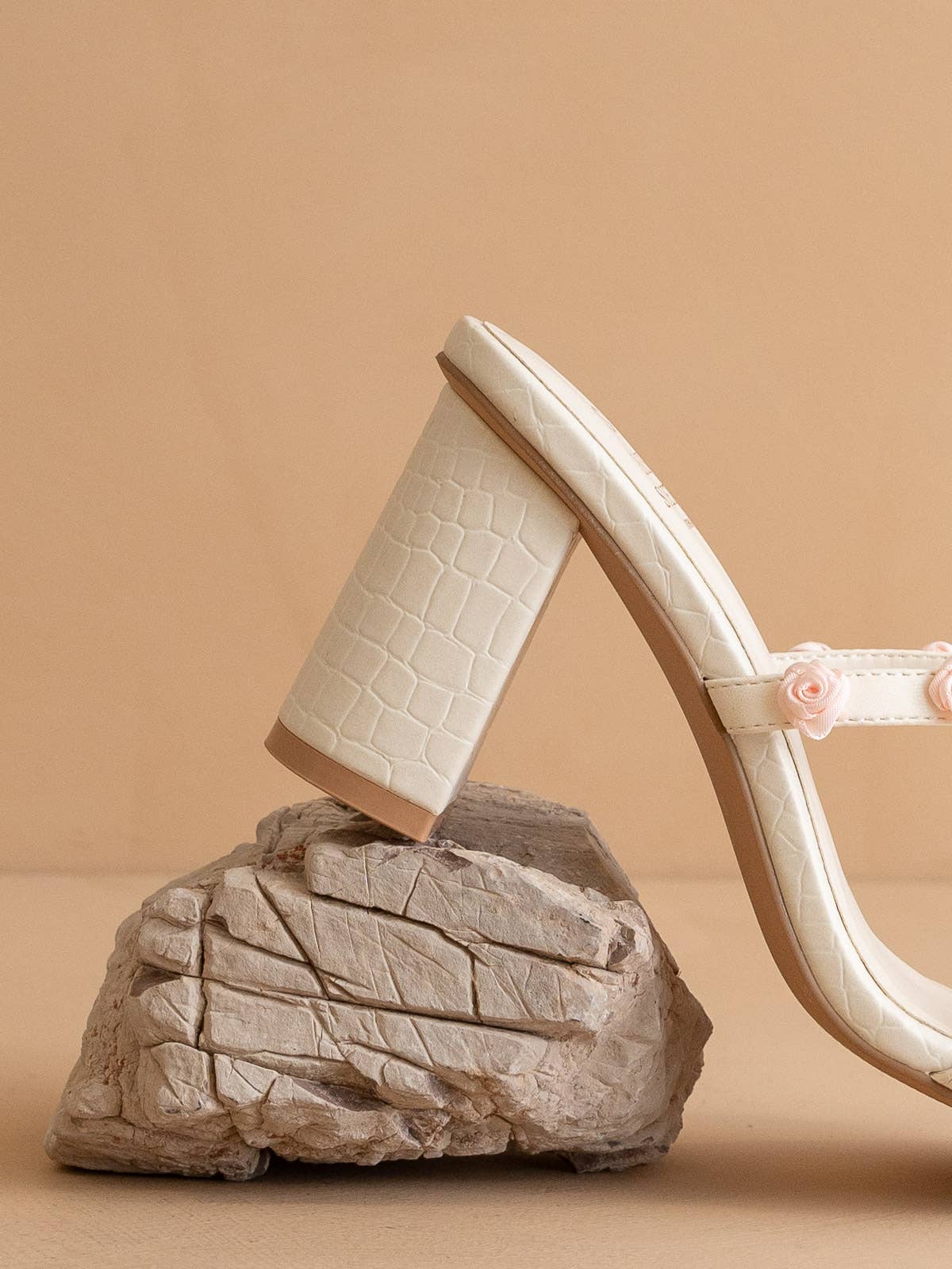 The Nia White | Rosette Adorned Heel for wholesale on Faire2