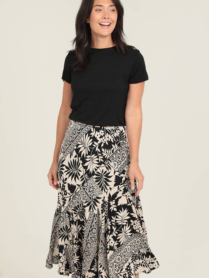 Jupe à taille élastique imprimé géométrique/tropical pour la vente par Nostalgia