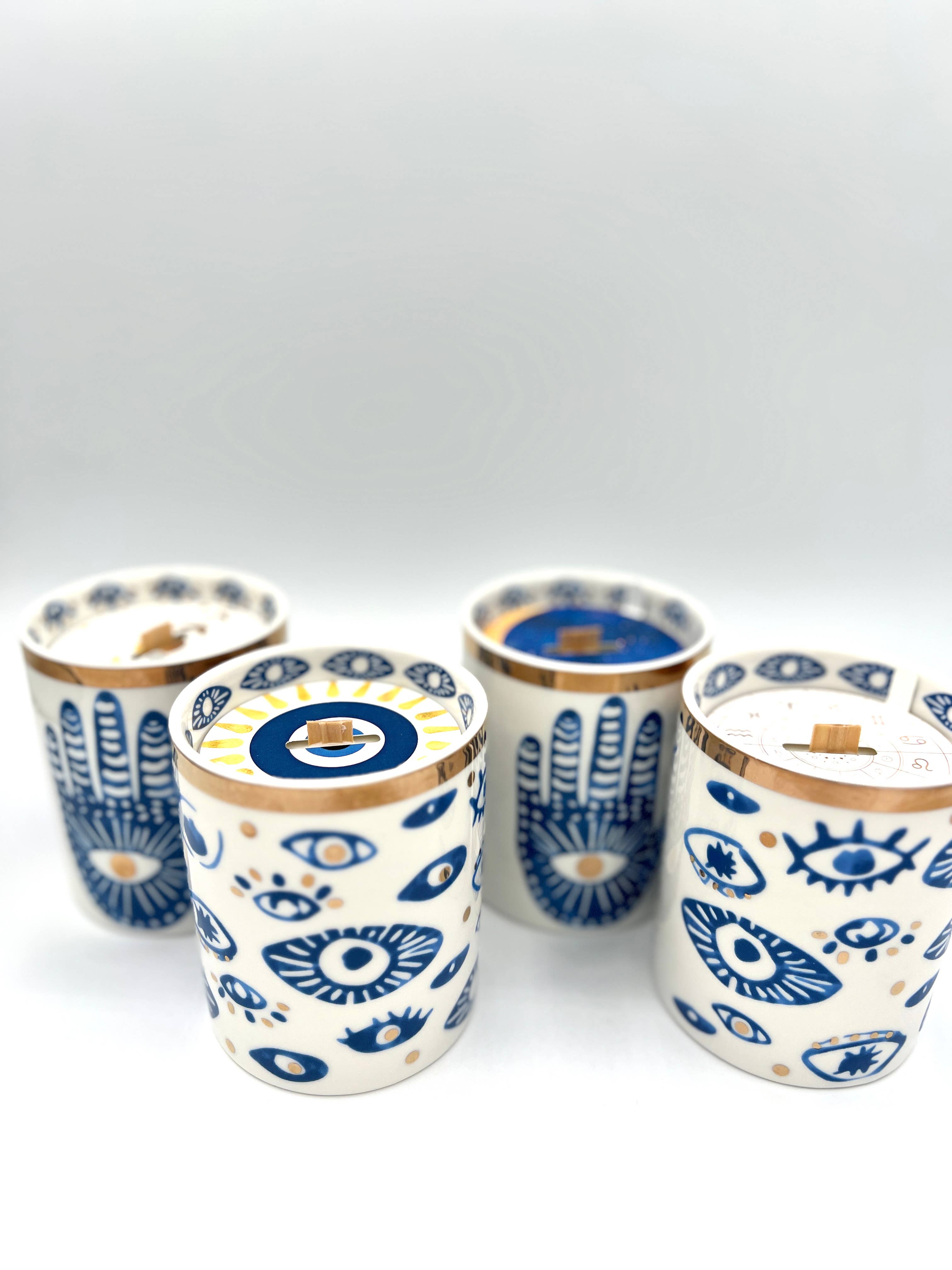 The Sacred Wild Candle Co – Velas de decoração por atacado – Nova vela Hamsa em cerâmica branca com detalhes em ouro e azul6