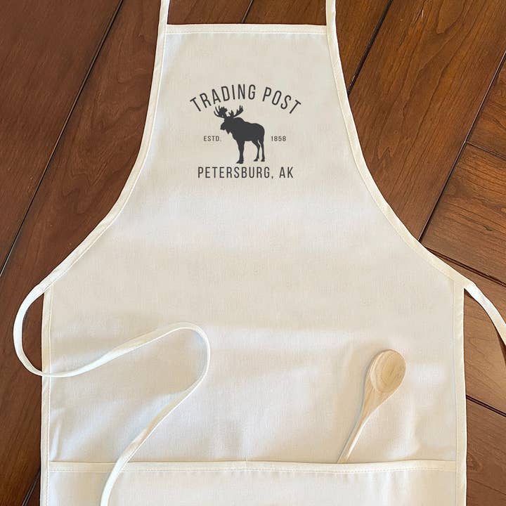 Trading Post w/ City, State - Custom Women's Apron for wholesale by North & Pine