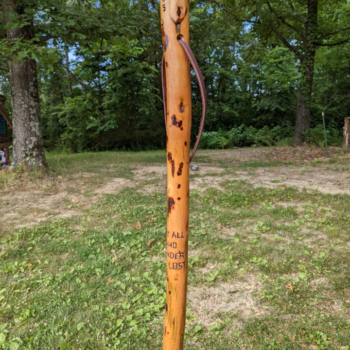 Creation Carvings LLC - Wholesale Sporting Accessories - Walking Stick with Compass carving & "Not all who wander are lost" quote, Hiking Stick, Up to 60" Tall strong wood staff for hiking.