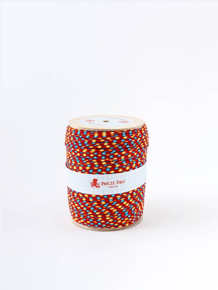 Bobine passepoil 100m Billy rouge pour la vente par Petit Pan