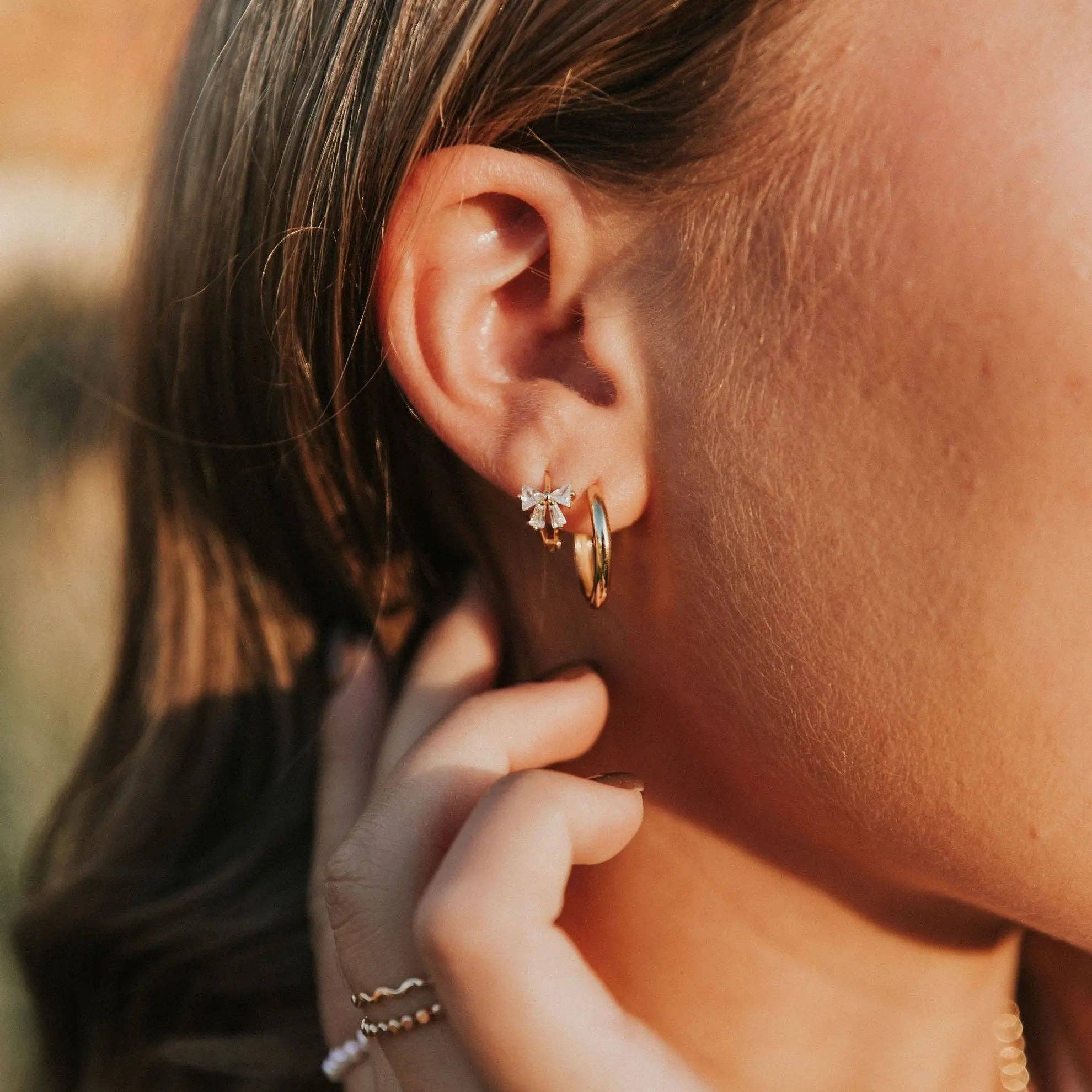 Mauve Jewelry Co. - Wholesale Huggie Earrings - Lucy Diamond Bow Hoops8