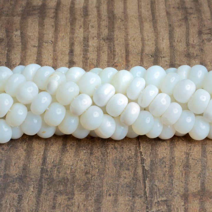 10mm White Opal Plain Rondelles 16 inch 65 beads for wholesale by The Bead Traders