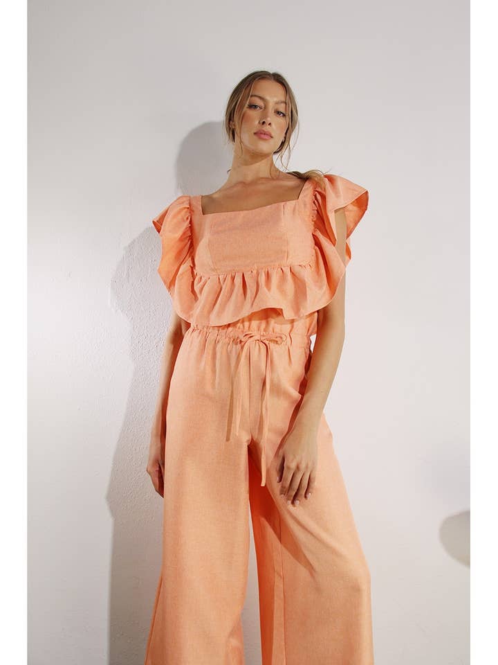 ENSEMBLE HAUT ET PANTALON BICOLORE À MANCHES VOLANTÉES pour la vente par Mulla