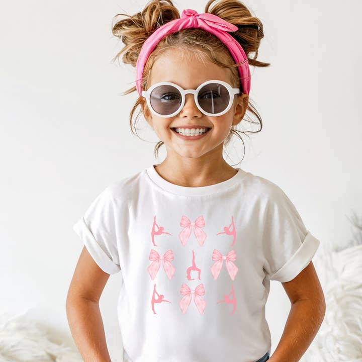 Noeuds coquette pour enfants et maillot de gymnaste pour la vente par The Landing @ Fusion