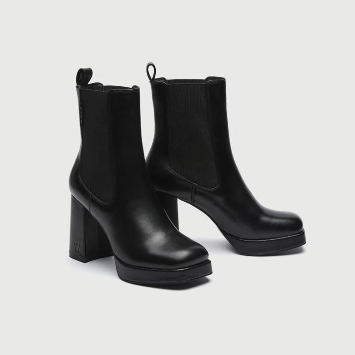 Black Poppy Chelsea Boot for wholesale on Faire