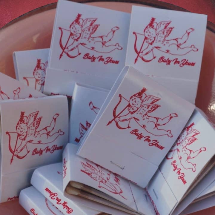 “Baby I’m Yours” cupid Matchbook and other Purchase Wholesale branded. Free Returns & Net 60 Terms on Faire trending on Faire.
