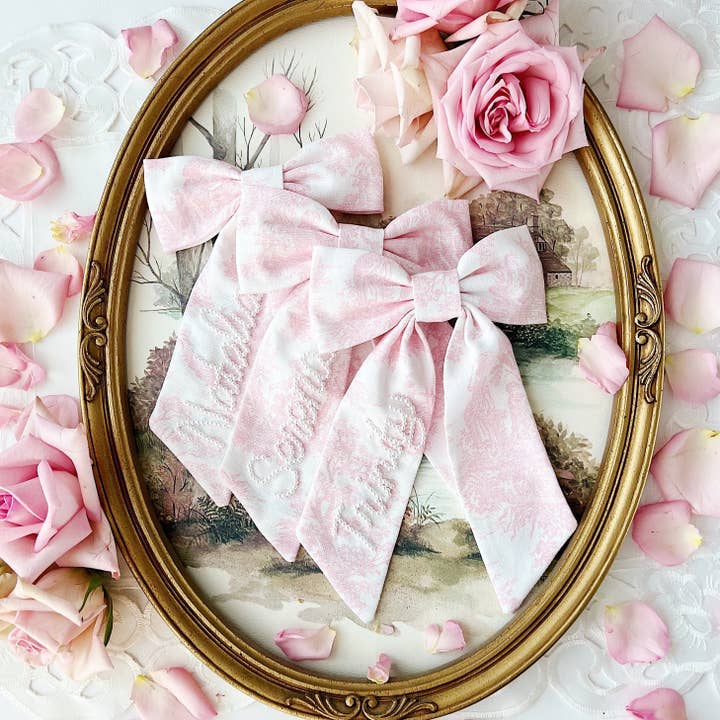 Pink Toile Sailor Pearl Bow for wholesale by Bebe Theory