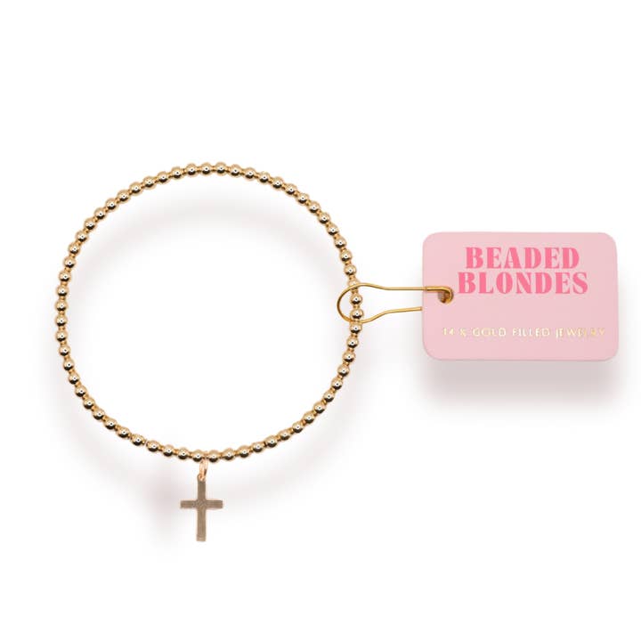 Bracelet à breloques en forme de croix pour la vente par Beaded Blondes