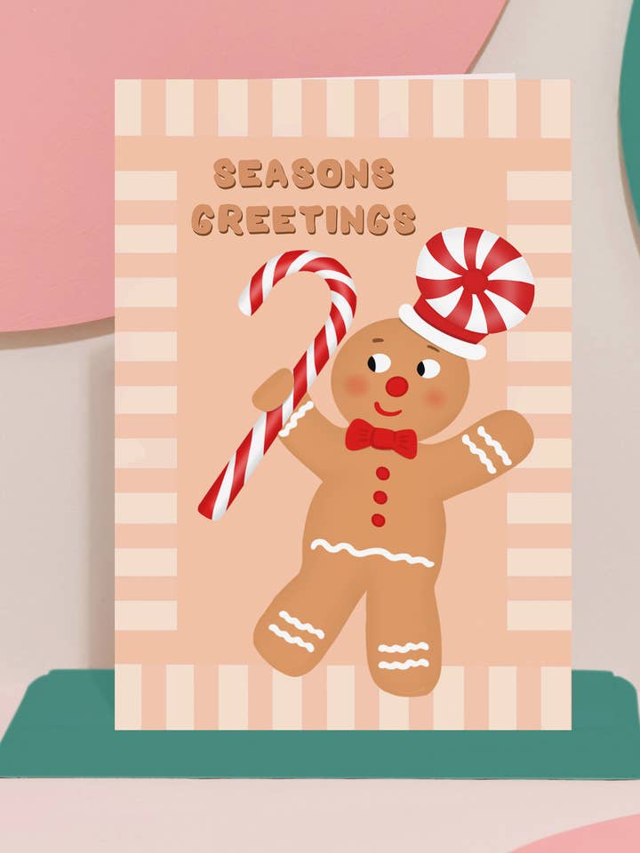 Biglietto di auguri ‘Omino di pan di zenzero natalizio’ per la vendita all'ingrosso da parte di Pink and Mint Design